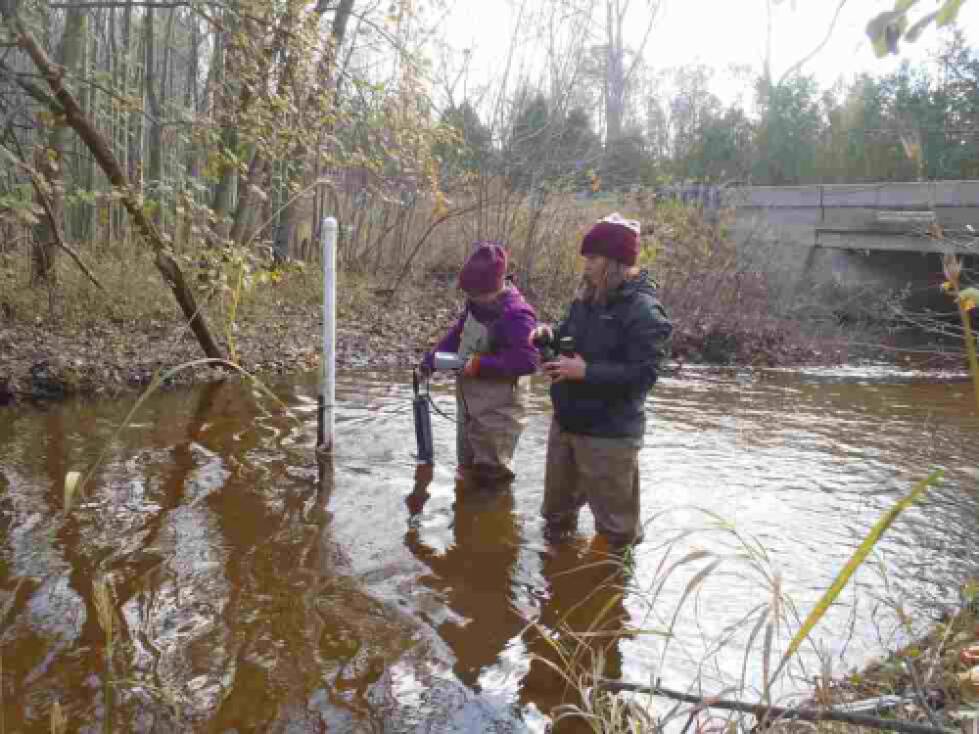 Sampling water quality in the Spring Lake watershed.